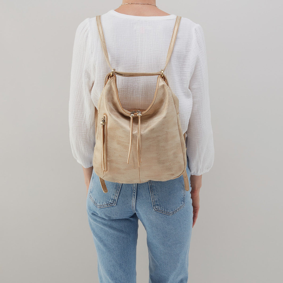 Merrin Convertible Backpack In Metallic Leather - Gold Leaf | HOBO