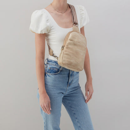 Cass Sling in Metallic Leather - Gold Leaf | HOBO