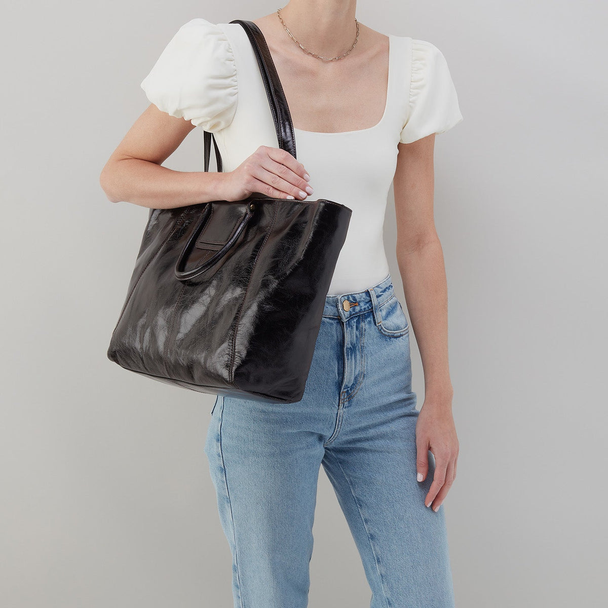 Sheila East-West Tote In Polished Leather - Black | HOBO