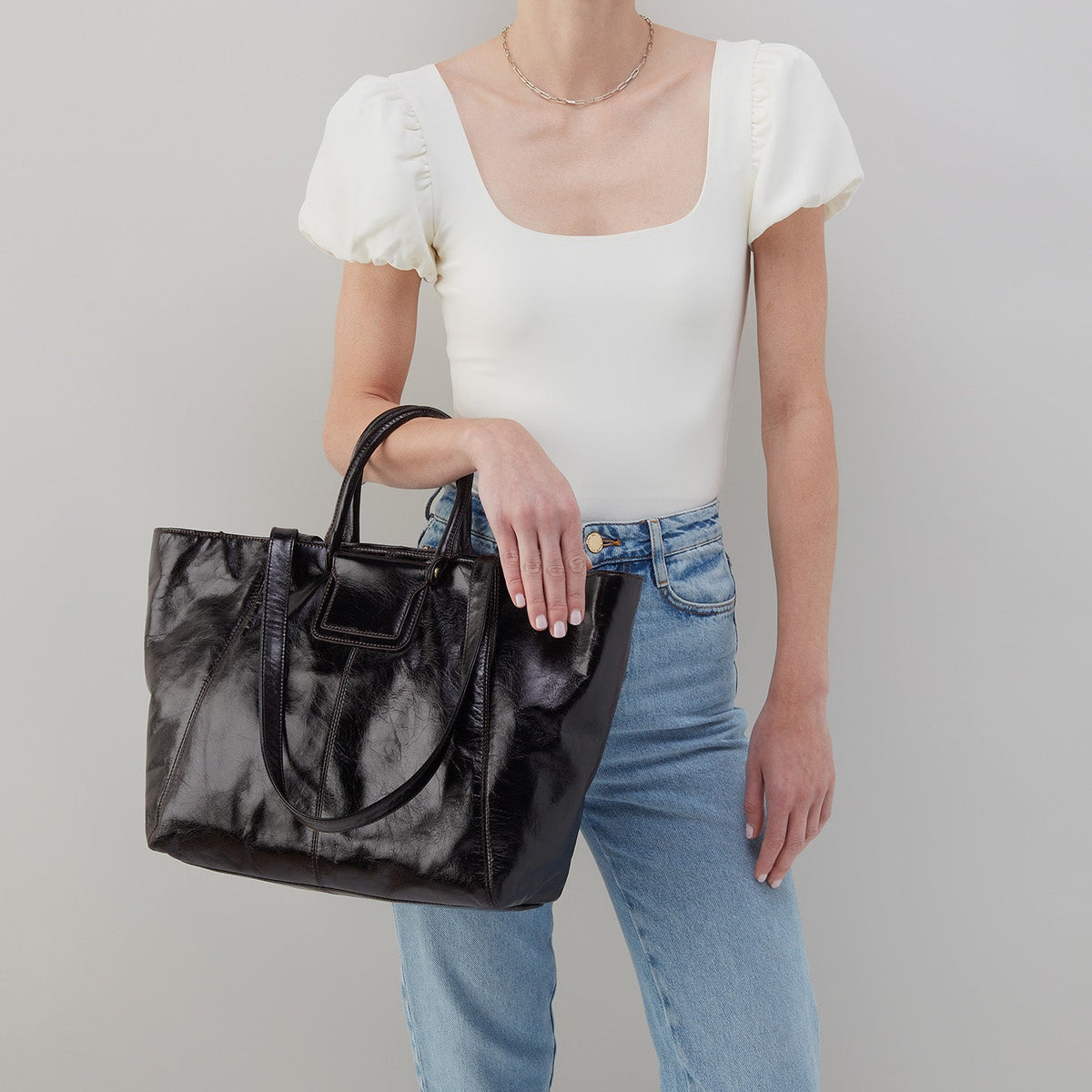 Sheila East-West Tote In Polished Leather - Black | HOBO