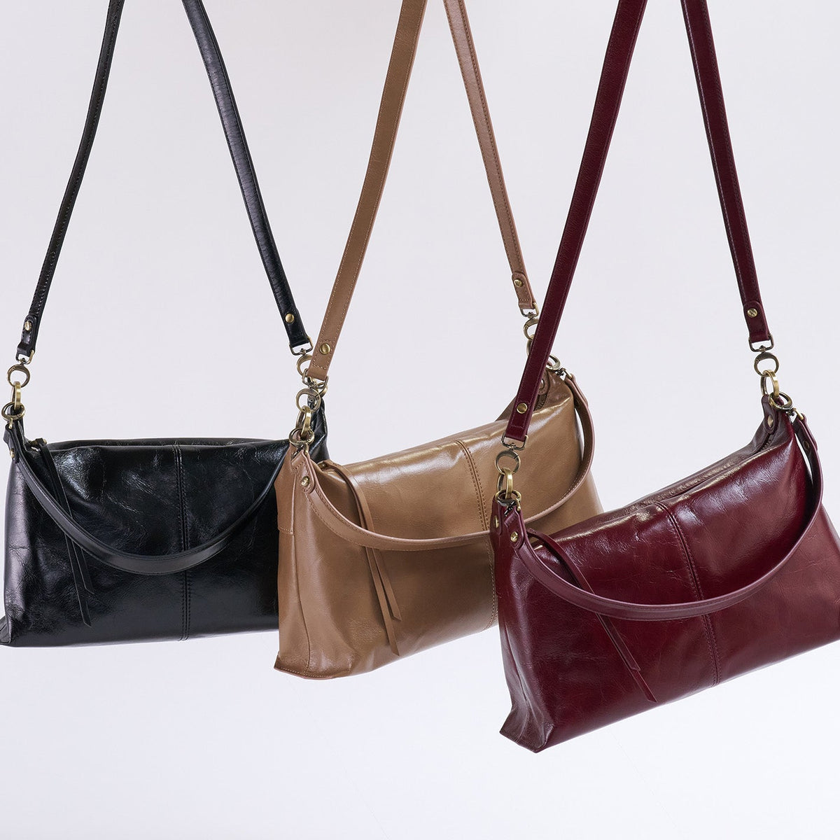 Avon Shoulder Bag In Polished Leather - Black | HOBO