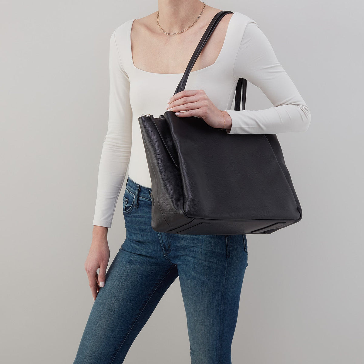 Essential Large Tote In Soft Saffiano Leather - Black | HOBO