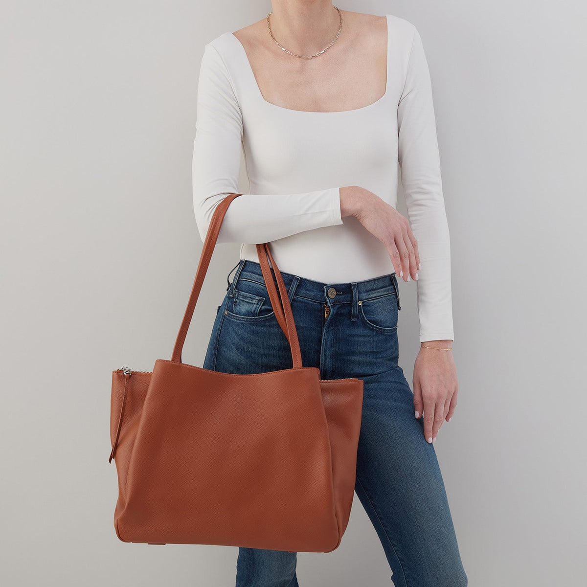 Essential Large Tote In Soft Saffiano Leather - Lion | HOBO