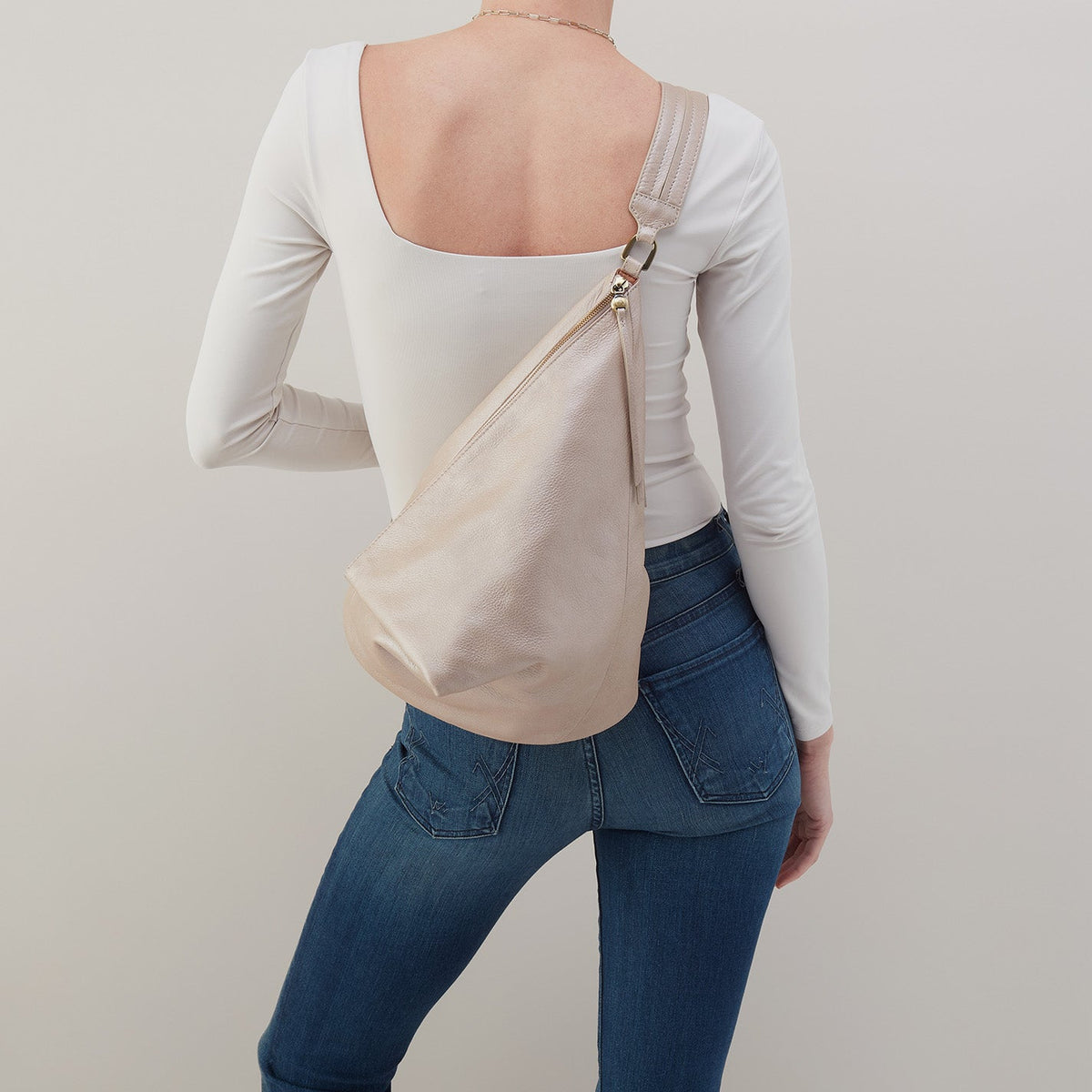 Sway Convertible Sling In Pebbled Metallic Leather - Grey Mist | HOBO
