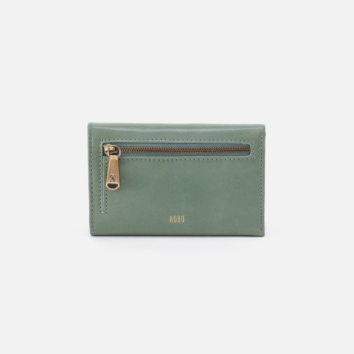 Jill Trifold Wallet In Polished Leather - Jade | HOBO