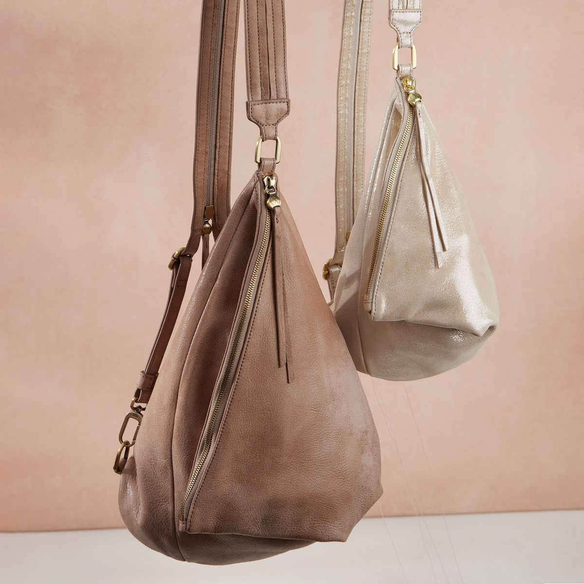 Sway Small Sling In Metallic Leather - Sand Shimmer | HOBO