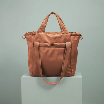 PLACES TO GO Tote in CaRefiber recycled nylon - Dune | HOBO