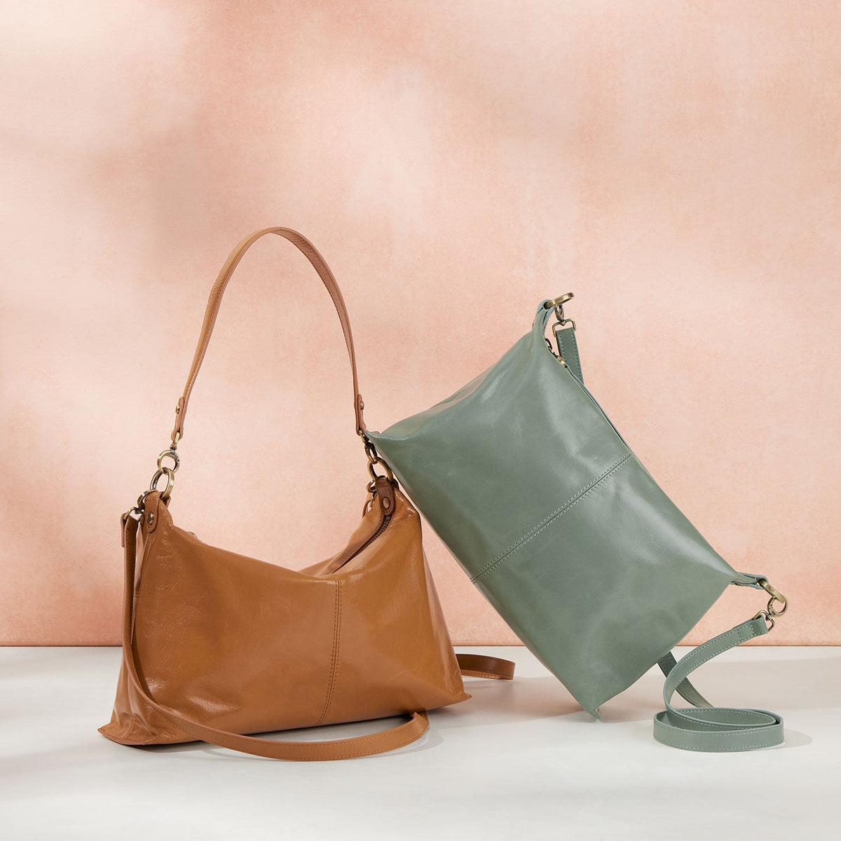 Avon Shoulder Bag In Polished Leather - Natural | HOBO