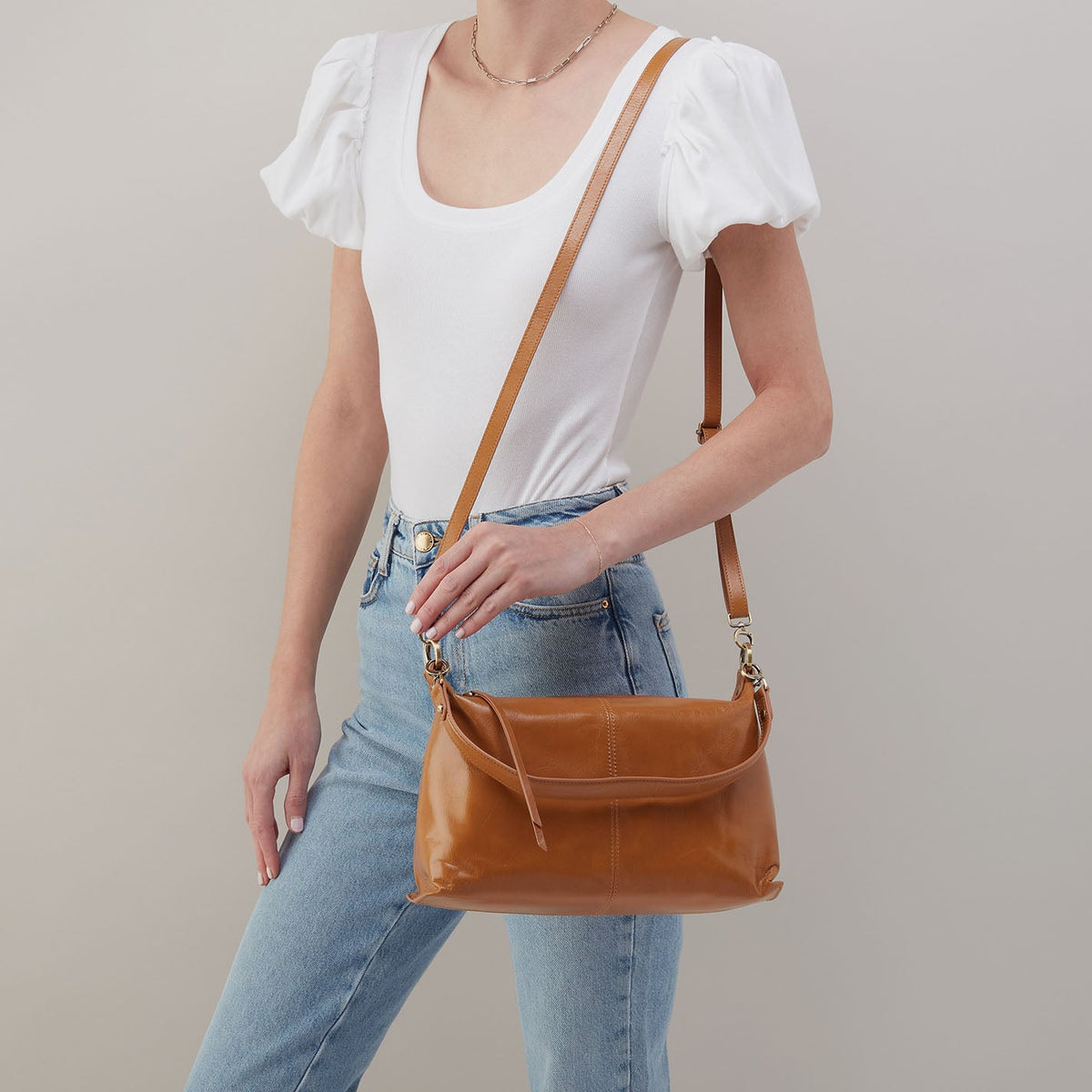 Avon Shoulder Bag In Polished Leather - Natural | HOBO