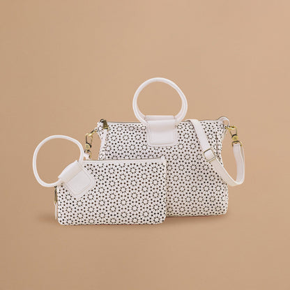 Sable Wristlet In Perforated Leather - Ecru Daisy Perf | HOBO