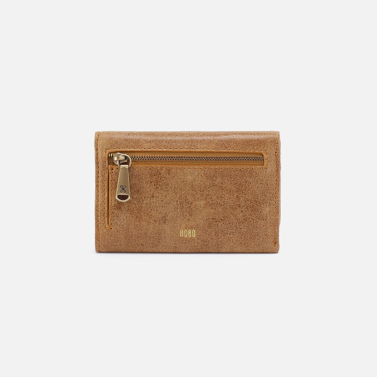 Jill Trifold Wallet In Buffed Leather - Whiskey | HOBO